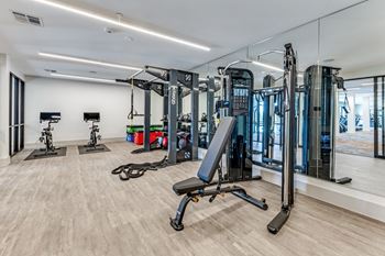 Yoga/spin area with peloton bikes